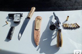 Dois homens presos com armas após briga por herança de terras