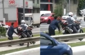 PM de SP é afastado ao puxar homem negro algemado a moto 