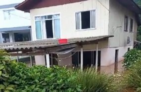 Famílias com casas alagadas ficam sem amparo em Luzerna