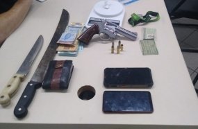 Casal é preso com drogas, arma de fogo e dinheiro 