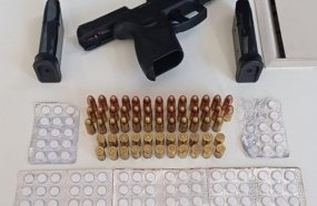 PRF flagra motorista de carreta com pistola, 'rebite' e carga acima do peso