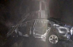 Carro e carreta pegam fogo após colisão na BR-153